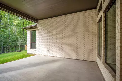 Exterior - 209 Lilac Tree Ct, Willis, TX 77318 photo 2 of 7