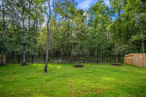 Exterior - 209 Lilac Tree Ct, Willis, TX 77318 photo 4 of 7