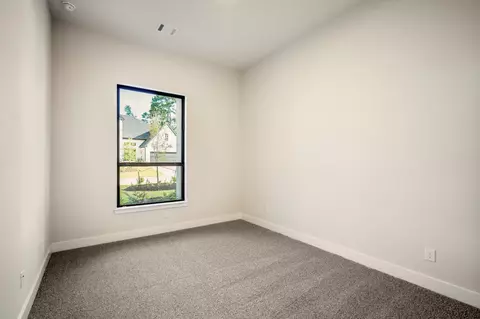 Bedroom - 209 Lilac Tree Ct, Willis, TX 77318 photo 2 of 6