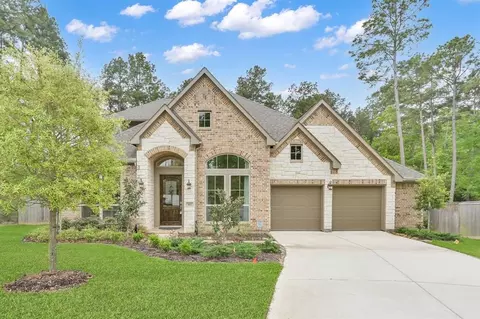 402 Changing Tide Ct, Willis, TX 77318 photo 1