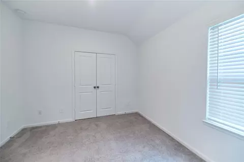 Bedroom - 665 Royal Arch Dr, Conroe, TX 77304 photo 9 of 9