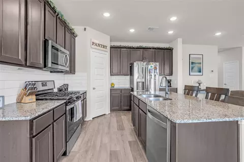Kitchen - 1732 Brushy Cedar Ct, Conroe, TX 77301 photo 3 of 4
