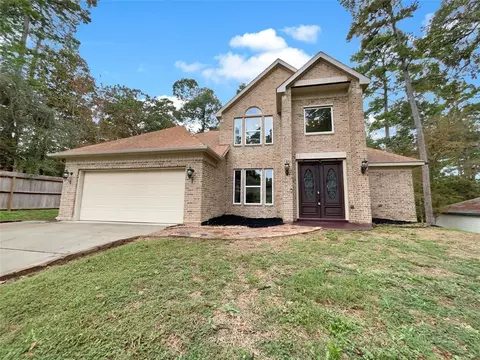 12229 W Comanche Cir, Willis, TX 77378 photo 1