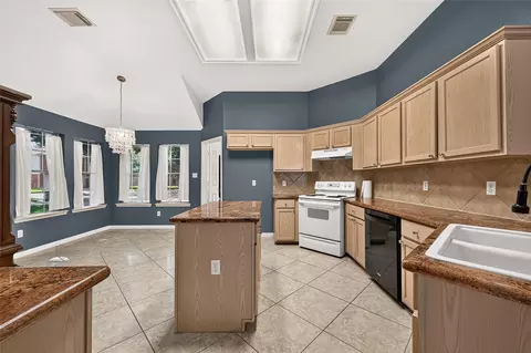 Kitchen - 12007 Viola Ct, Pinehurst, TX 77362 photo 1 of 8