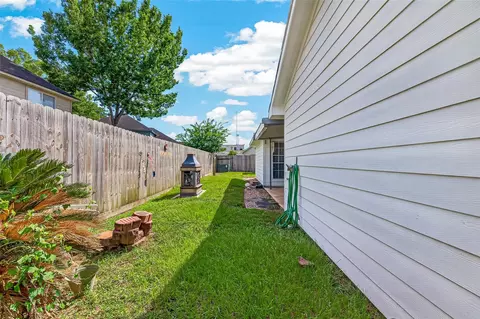 Exterior - 12007 Viola Ct, Pinehurst, TX 77362 photo 9 of 9