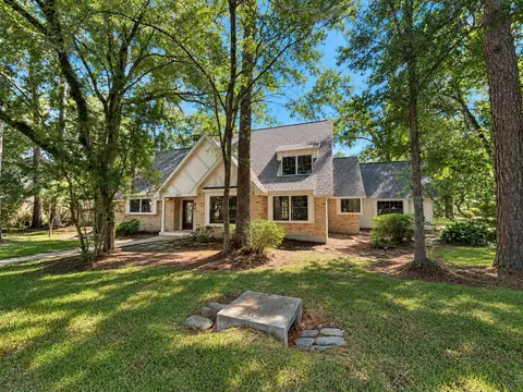 Exterior - 10715 E Timberwagon Cir, Spring, TX 77380 photo 2 of 11