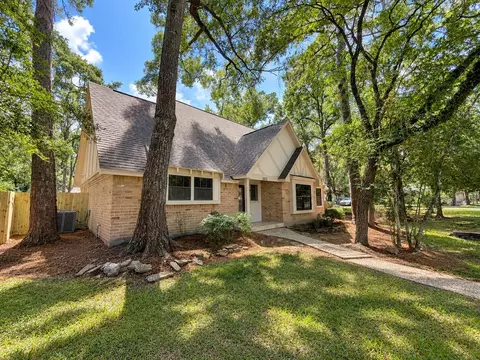 Exterior - 10715 E Timberwagon Cir, Spring, TX 77380 photo 4 of 11