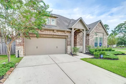 Exterior - 404 Summit Ridge Ct, Willis, TX 77318 photo 3 of 8
