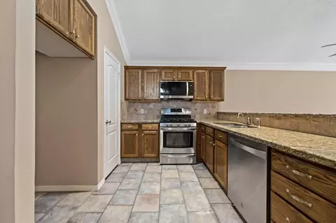 Kitchen - 11353 Windlass Ln, Willis, TX 77318 photo 2 of 3