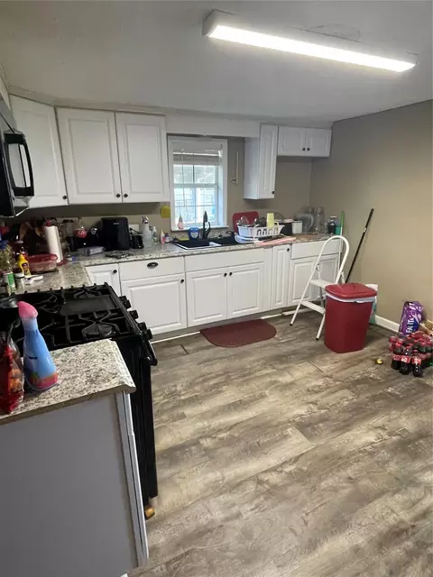 Kitchen - 208 E Pecan Ln, Clute, TX 77531 photo 1 of 3