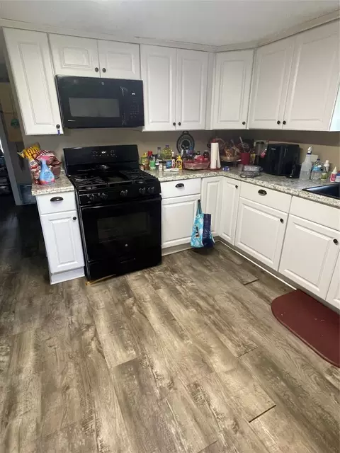 Kitchen - 208 E Pecan Ln, Clute, TX 77531 photo 2 of 3