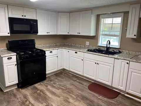 Kitchen - 208 E Pecan Ln, Clute, TX 77531 photo 3 of 3