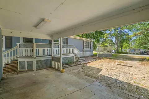 Exterior - 13707 Brigadier Dr, Willis, TX 77318 photo 5 of 10