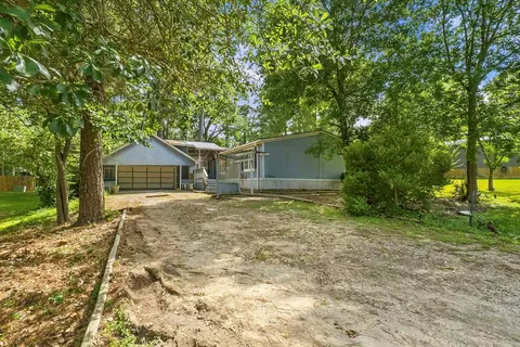 Exterior - 13707 Brigadier Dr, Willis, TX 77318 photo 1 of 10