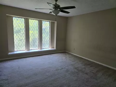 Bedroom - 7244 Edgewater Dr, Willis, TX 77318 photo 1 of 4