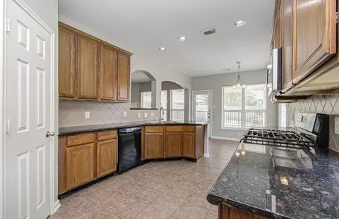 Kitchen - 6715 Starcroft Ct, Spring, TX 77379 photo 9 of 10