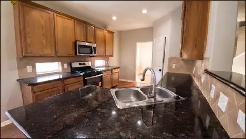 Kitchen - 6715 Starcroft Ct, Spring, TX 77379 photo 2 of 10