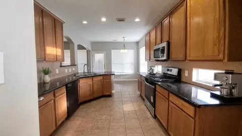 Kitchen - 6715 Starcroft Ct, Spring, TX 77379 photo 1 of 10