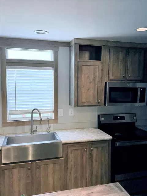 Kitchen - 15541 Schank Rd, Conroe, TX 77306 photo 7 of 7