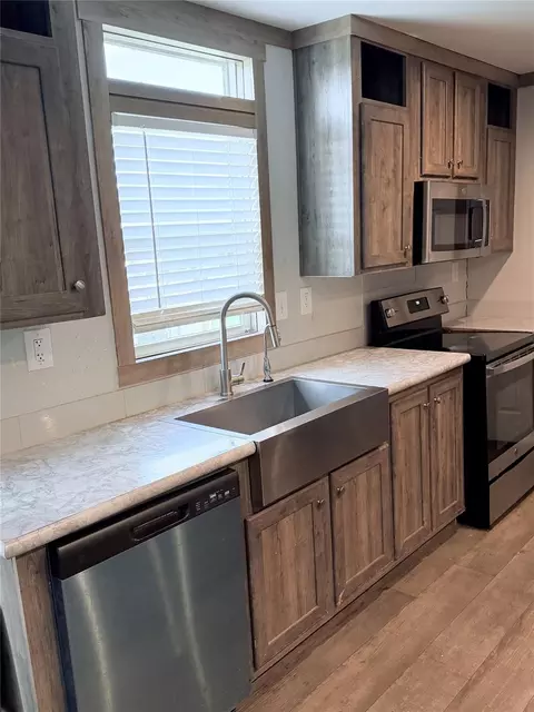 Kitchen - 15541 Schank Rd, Conroe, TX 77306 photo 5 of 7