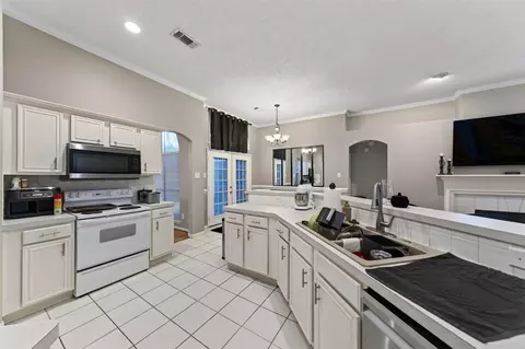 Kitchen - 31303 Baker Lake Dr, Spring, TX 77386 photo 2 of 2