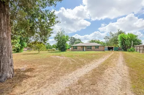 Exterior - 2934 Goodson Loop, Pinehurst, TX 77362 photo 2 of 10