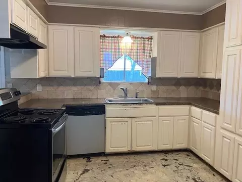Kitchen - 407 Wilson Rd, Conroe, TX 77301 photo 1 of 3