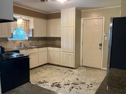 Kitchen - 407 Wilson Rd, Conroe, TX 77301 photo 2 of 3