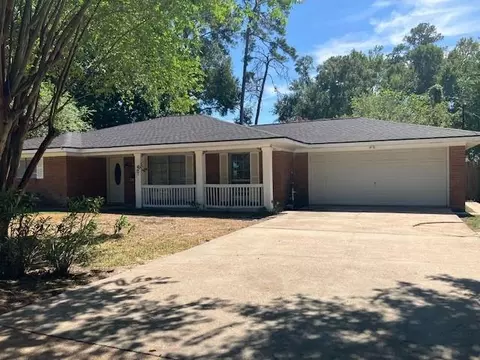 Exterior - 407 Wilson Rd, Conroe, TX 77301 photo 2 of 4