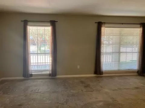 Living - 407 Wilson Rd, Conroe, TX 77301 photo 1 of 2