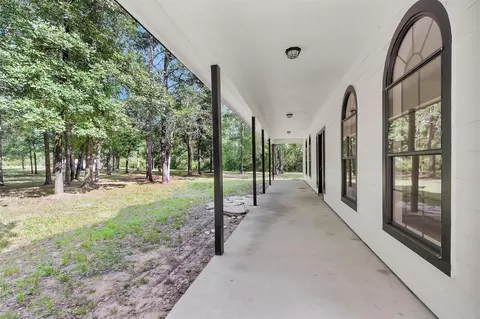 Exterior - 14657 Cedar Lane Loop, Willis, TX 77378 photo 3 of 5