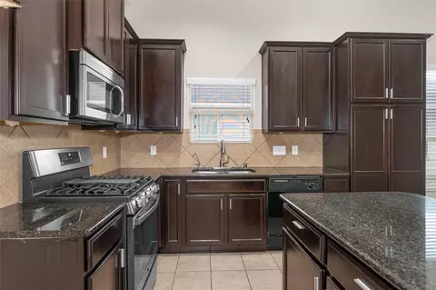 Kitchen - 21419 Fossil Trails Dr, Spring, TX 77388 photo 3 of 4