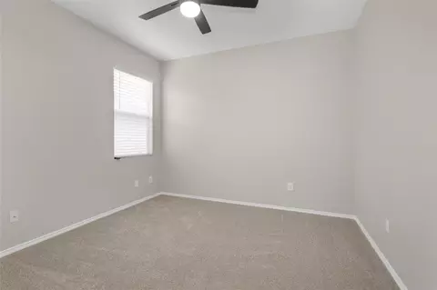 Bedroom - 21419 Fossil Trails Dr, Spring, TX 77388 photo 5 of 8