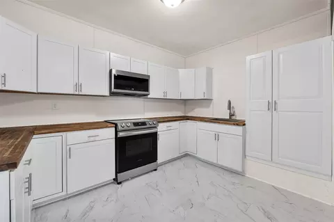 Kitchen - 335 N Robb St, Trinity, TX 75862 photo 2 of 2