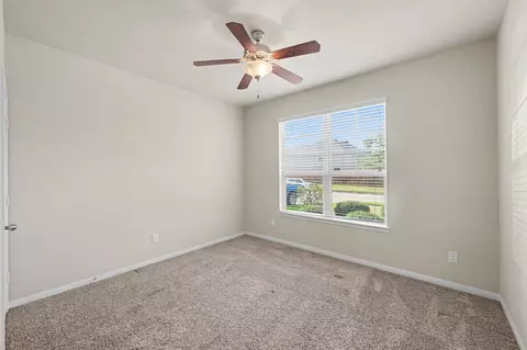 Bedroom - 24526 Grayson Falls Ln, Spring, TX 77389 photo 8 of 15
