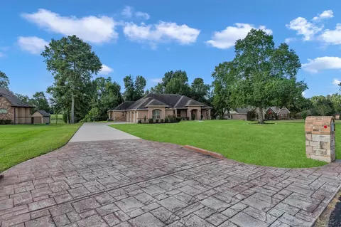 Exterior - 1735 Opal Trl, Willis, TX 77378 photo 3 of 10
