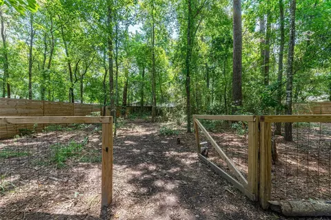 Exterior - 1601 Beech Dr, Conroe, TX 77385 photo 9 of 13