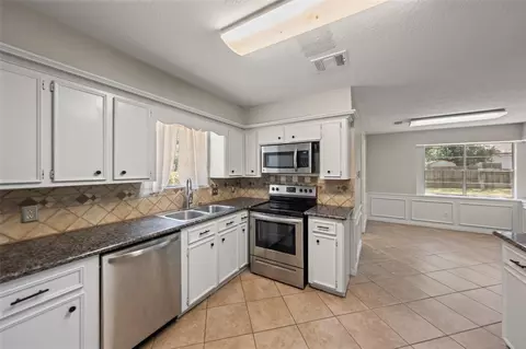 Kitchen - 8407 Barmby Ct, Spring, TX 77389 photo 1 of 2