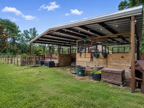 Exterior - 12654 Maxwell St, Willis, TX 77378 photo 5 of 17