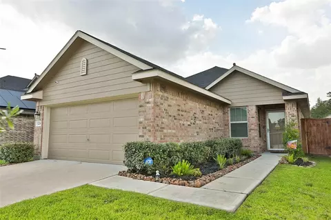 1206 Blue Hazel Ct, Pinehurst, TX 77362 photo 1