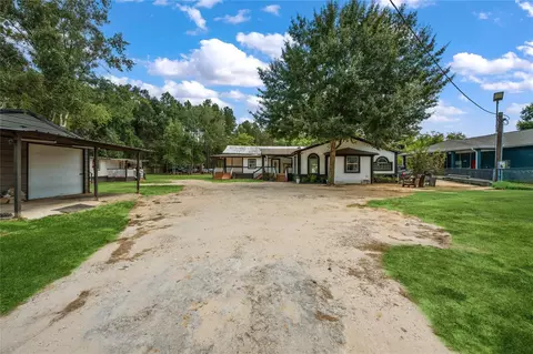 669 County Road 3408, Cleveland, TX 77327