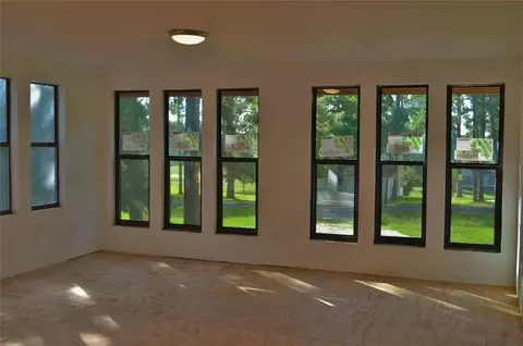 Living - 40 Pine Shadows Ln, Coldspring, TX 77331 photo 2 of 2