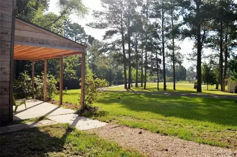 Exterior - 40 Pine Shadows Ln, Coldspring, TX 77331 photo 5 of 14