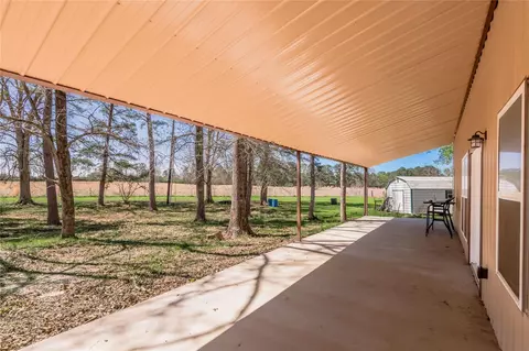 Exterior - 1533 Kickapoo Rd, Groveton, TX 75845 photo 7 of 11