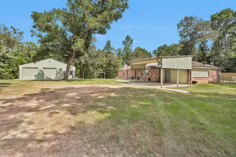 Exterior - 586 Diggs Rd, Willis, TX 77378 photo 3 of 9