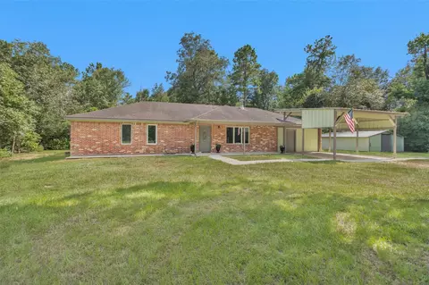 Exterior - 586 Diggs Rd, Willis, TX 77378 photo 2 of 9