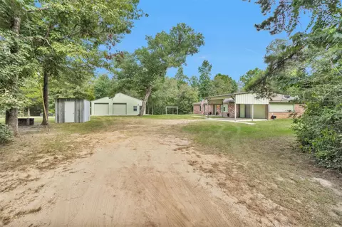 Exterior - 586 Diggs Rd, Willis, TX 77378 photo 8 of 9