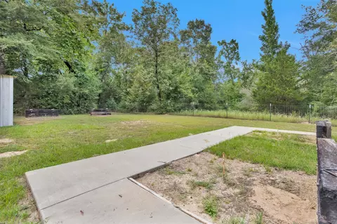 Exterior - 586 Diggs Rd, Willis, TX 77378 photo 7 of 9