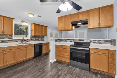 Kitchen - 586 Diggs Rd, Willis, TX 77378 photo 1 of 2