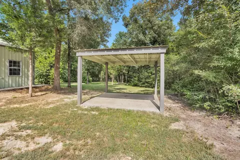 Exterior - 586 Diggs Rd, Willis, TX 77378 photo 5 of 9